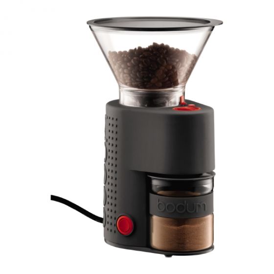a black coffee grinder while a transparent catch cup and a bean hopper