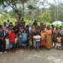 Dean with a large group of farmers and children