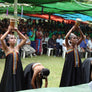Indonesian women performing in front of a crowd