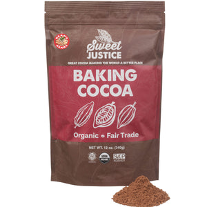 A bag of Sweet Justice Baking Cocoa, with a small pile of cocoa in front