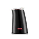 a black coffee grinder with a clear lid and red button