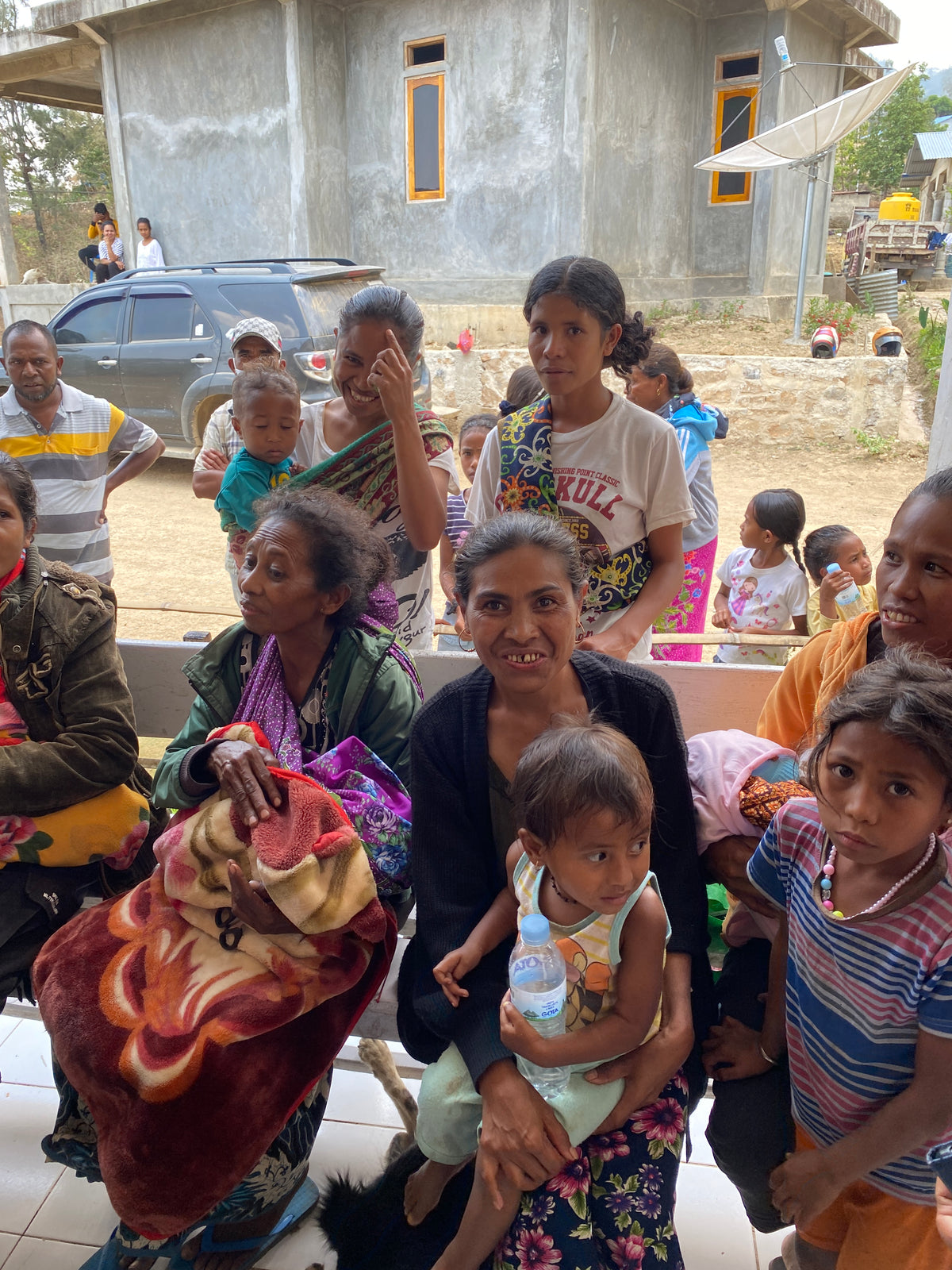 women and children waiting at the clinic