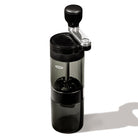 a hand cranked coffee grinder