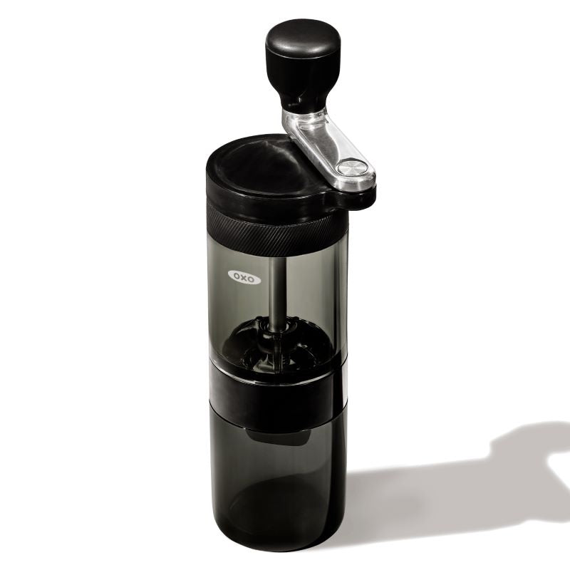 a hand cranked coffee grinder