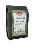 The front of a 16 ounce bag of Dean’s Bean’s Organic coffee labeled “Hazelnut Dream Decaf”