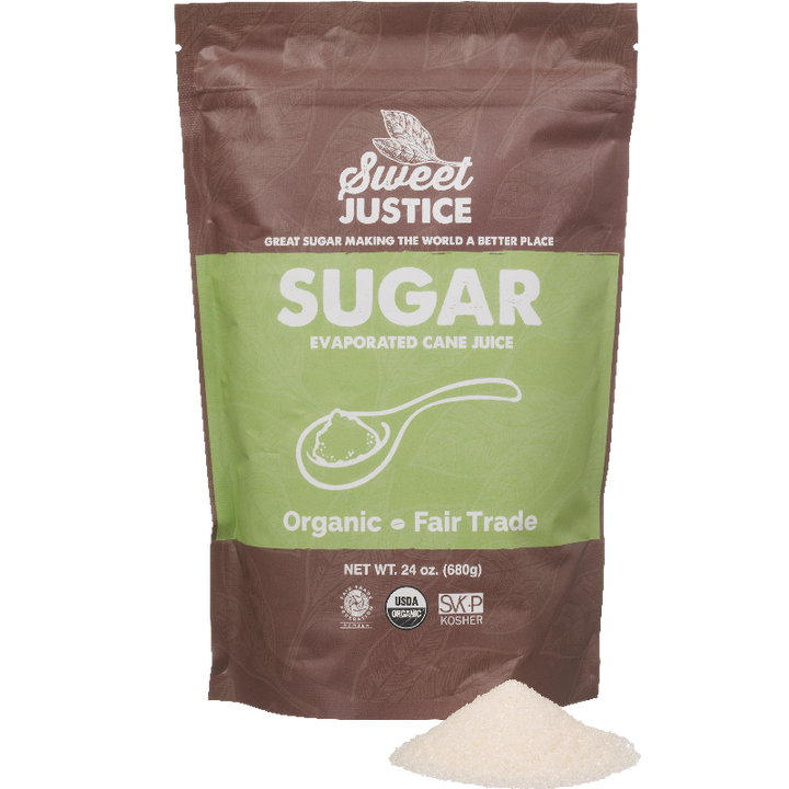 A bag of Sweet Justice Sugar, with a small pile of sugar in front
