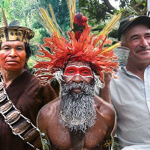 Indigenous Peruvian farmers in traditional dress and a man in modern clothes.