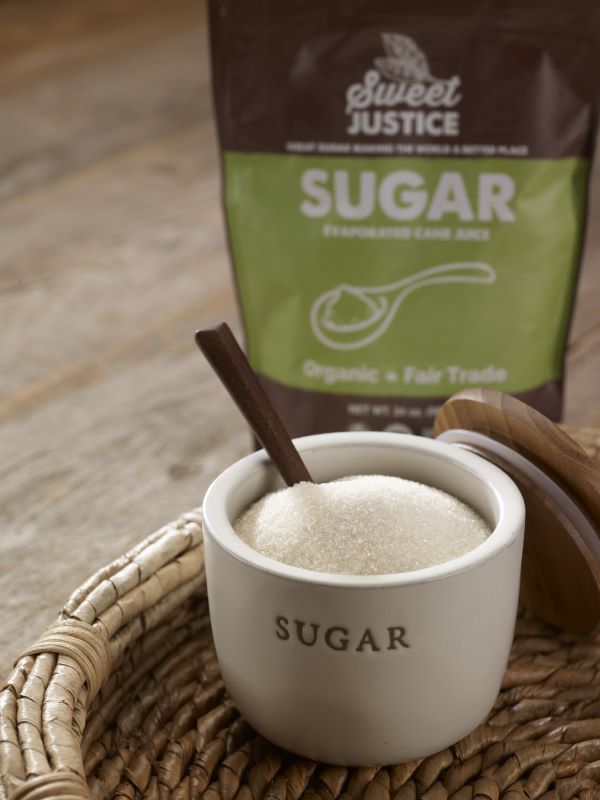 A small sugar dish filled with Sweet Justice sugar